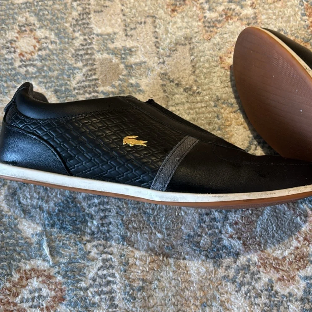 Lacoste Black and White Slip-On Sneakers - Picture 2 of 2